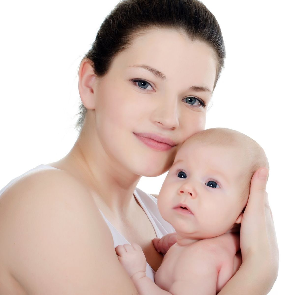 A mother holding her baby close